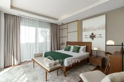 Luxurious bedroom with modern decor, featuring a large window and elegant furnishings, perfect for relaxation.