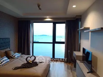 Luxurious bedroom with stunning ocean view and elegant decor
