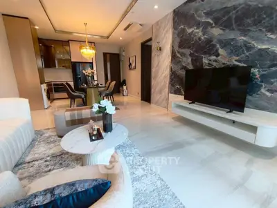 Luxurious modern living room with elegant marble accents and open layout
