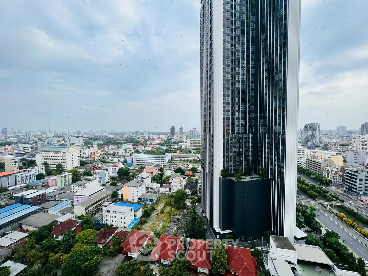 Stunning cityscape view with modern high-rise building and vibrant urban landscape.