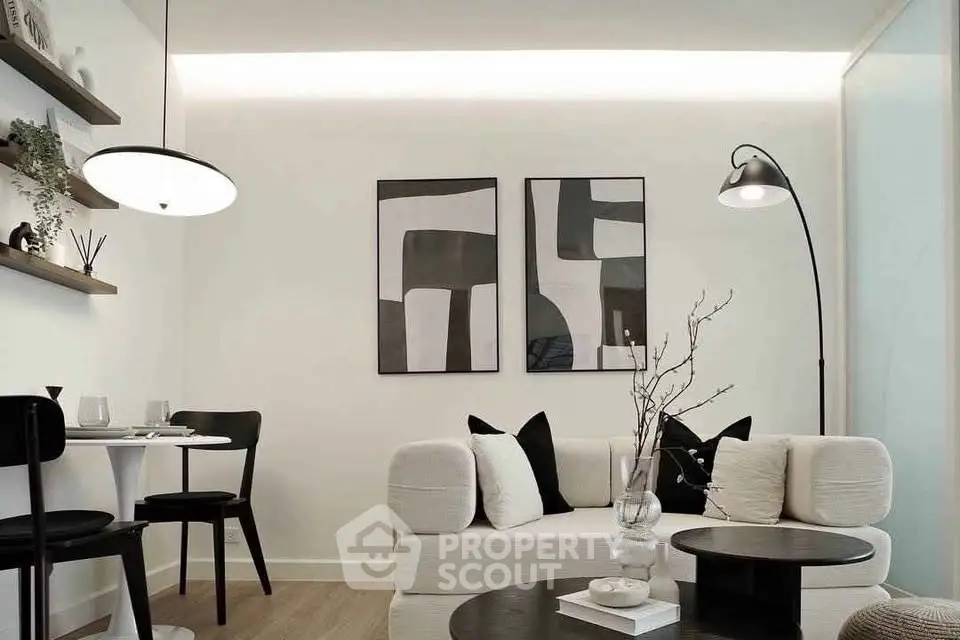 Modern living room with stylish decor and cozy seating area.