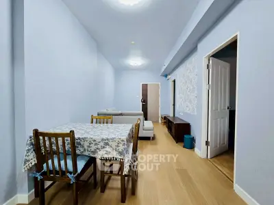 Spacious living room with elegant dining area and stylish decor