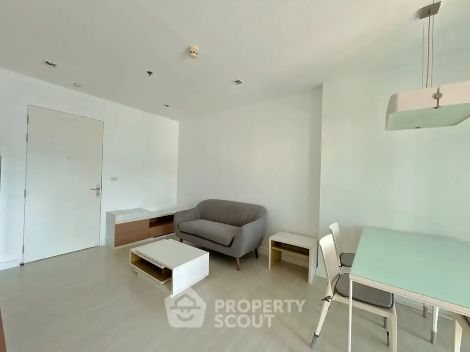 Modern living room with minimalist furniture and natural light