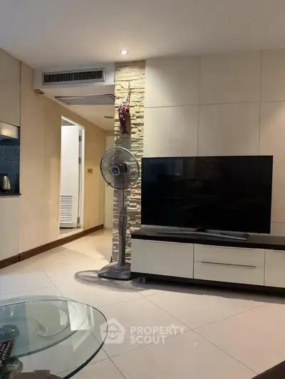 Modern living room with sleek TV setup and stylish decor