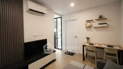 Modern living room with air conditioning and stylish decor in a cozy apartment.