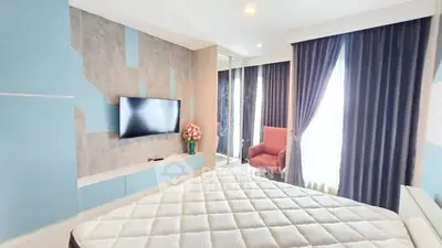 Modern bedroom with stylish decor and natural light