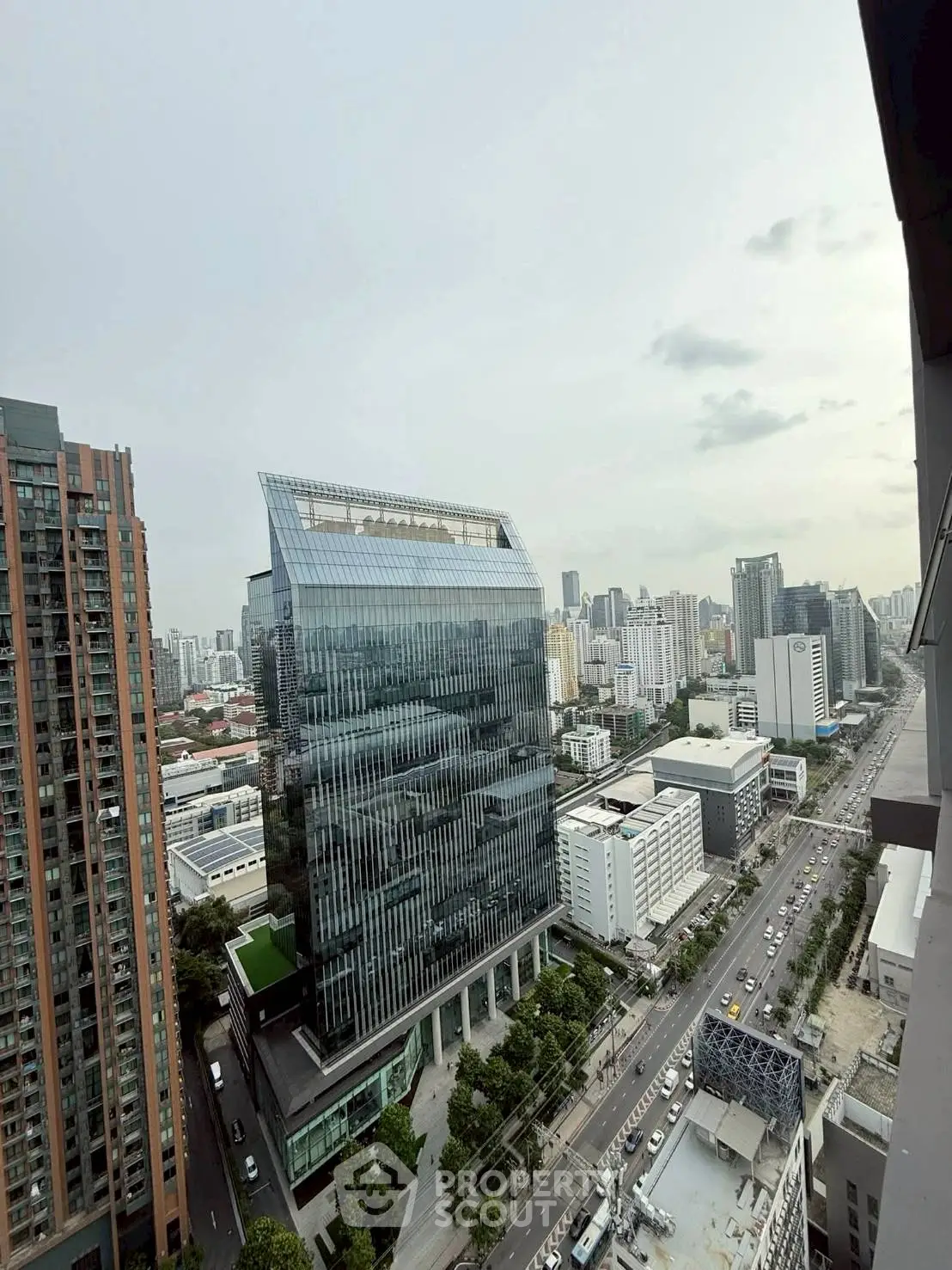 Stunning cityscape view featuring modern high-rise buildings and bustling urban streets.