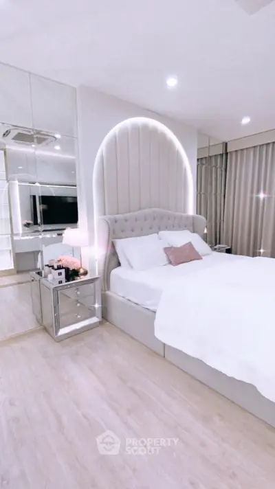 Luxurious modern bedroom with elegant decor and ambient lighting