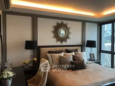 Luxurious bedroom with elegant decor and city view, featuring plush bedding and stylish lighting.