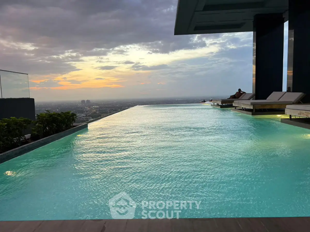 Stunning rooftop infinity pool with breathtaking sunset view