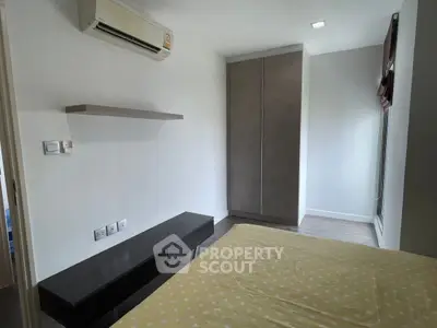 Modern bedroom with air conditioning and minimalist furniture design