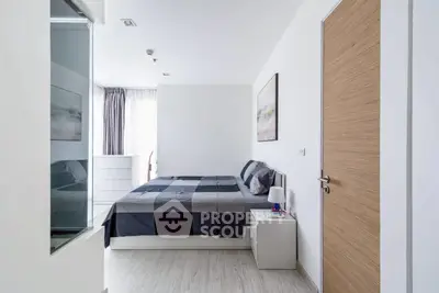 Modern bedroom with sleek design and natural light