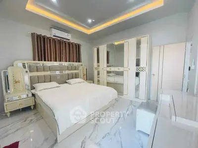 Luxurious bedroom with elegant decor and modern lighting