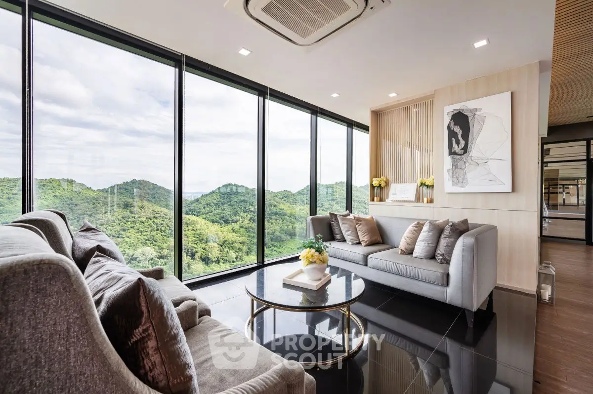 Luxurious living room with panoramic mountain views and modern decor