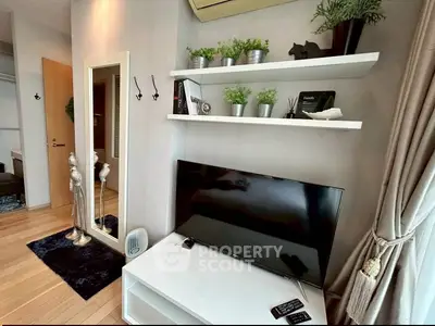 Modern living room with sleek TV setup and stylish decor