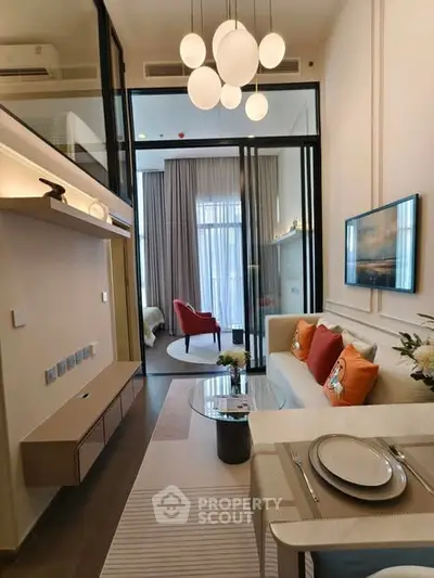 Modern living room with high ceiling and stylish decor in a luxury apartment