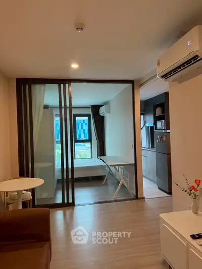 Modern studio apartment with open layout and stylish furnishings
