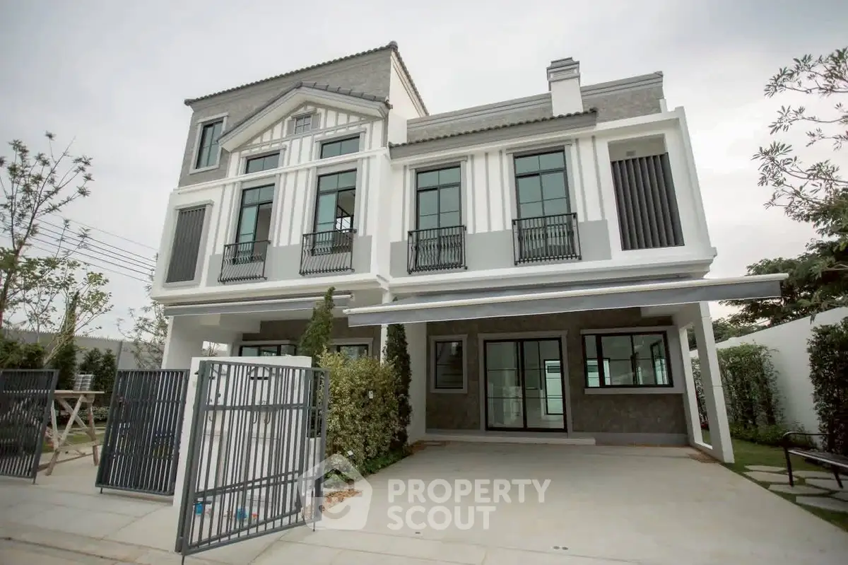 Stunning modern two-story house with elegant facade and spacious driveway