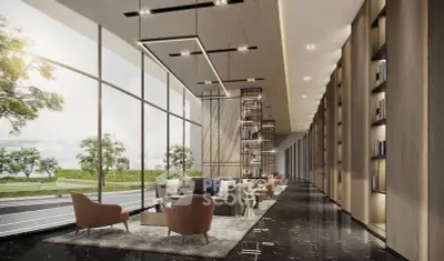 Luxurious modern lobby with elegant seating and floor-to-ceiling windows offering scenic views.