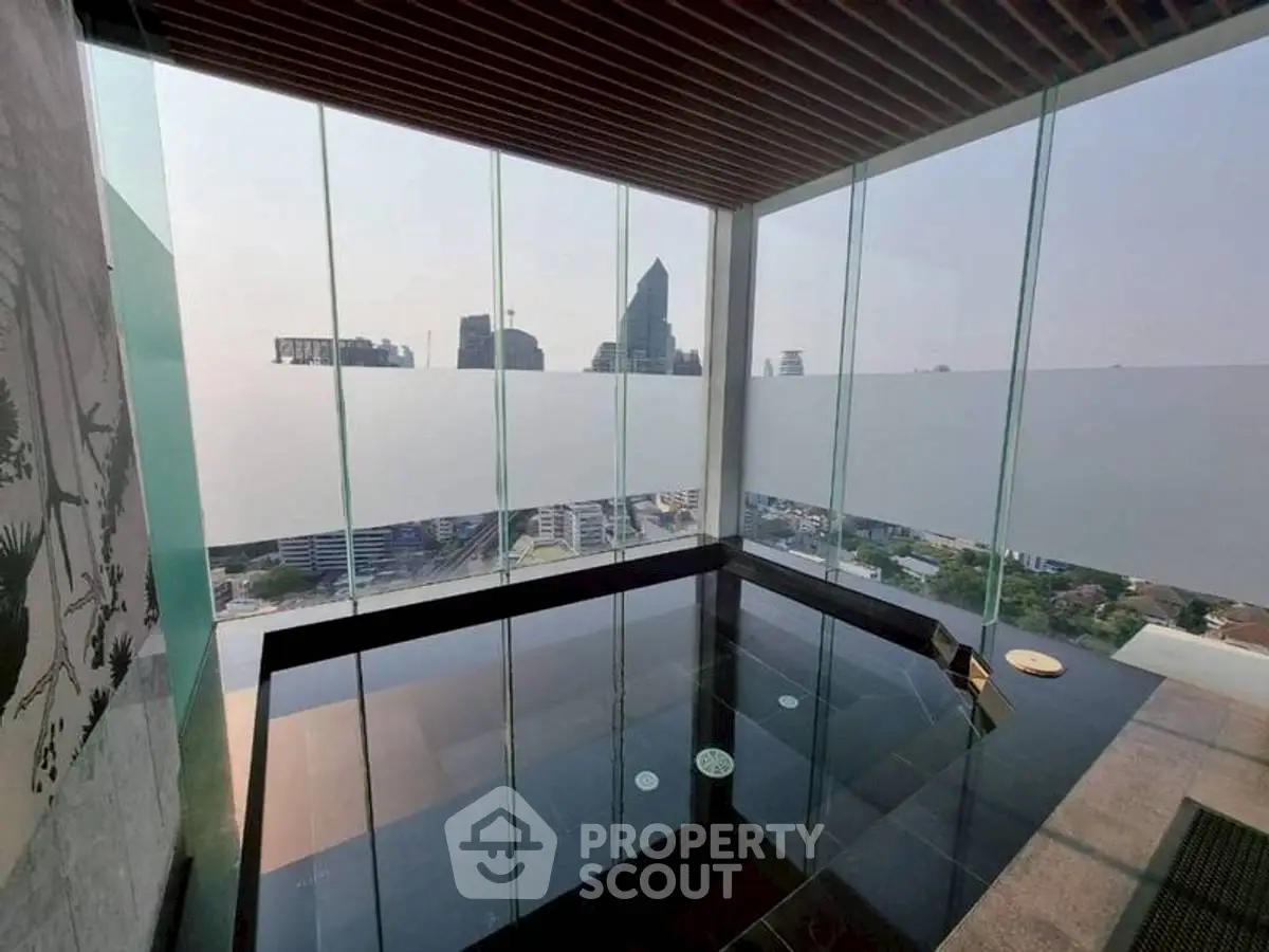 Luxurious rooftop pool with stunning city skyline view