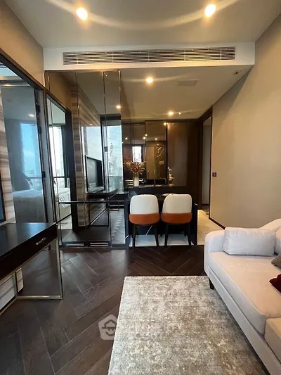 Luxurious modern living room with elegant decor and stylish furniture in a high-end apartment.