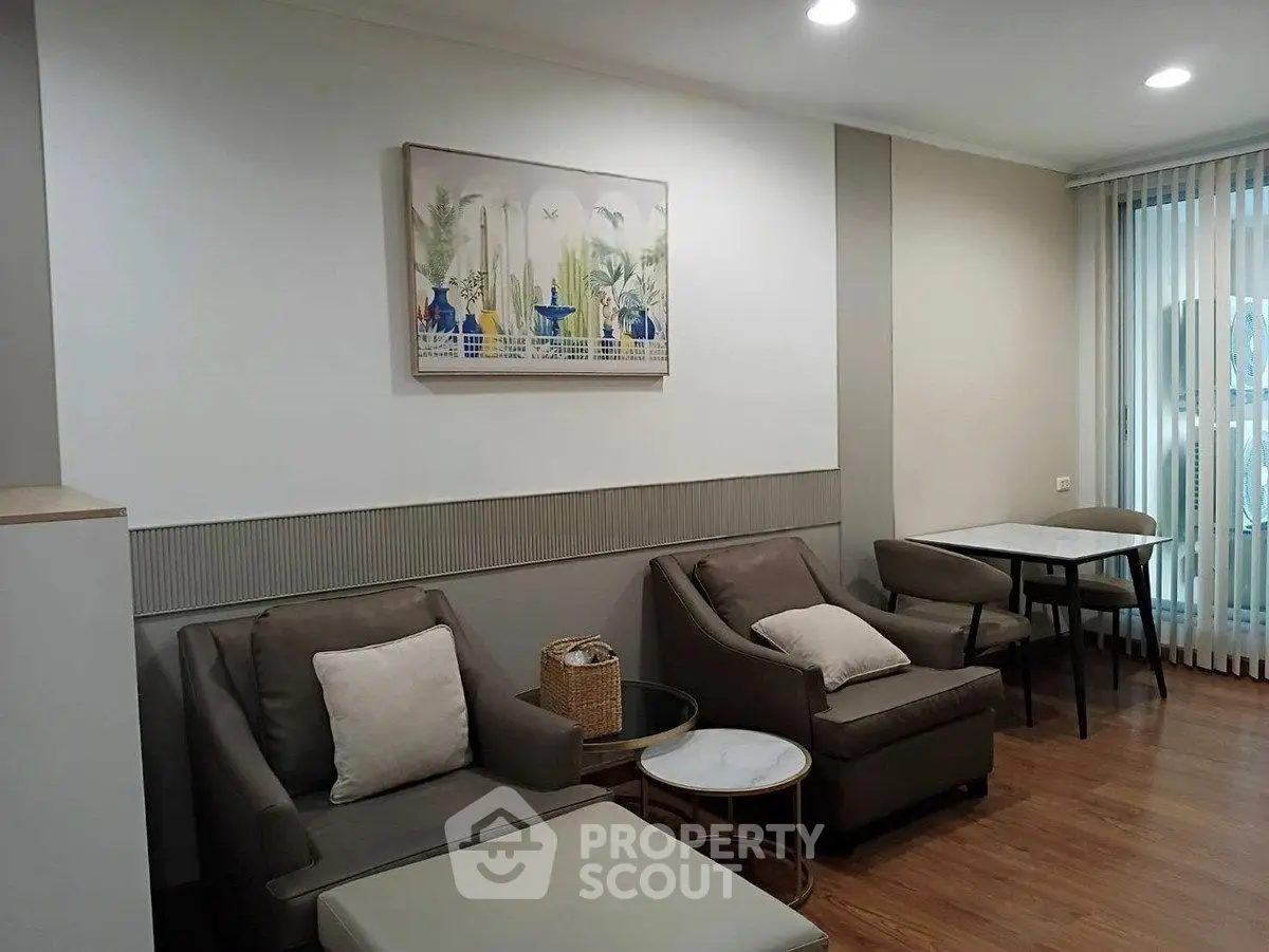 Cozy living room with modern decor and comfortable seating, perfect for relaxation.