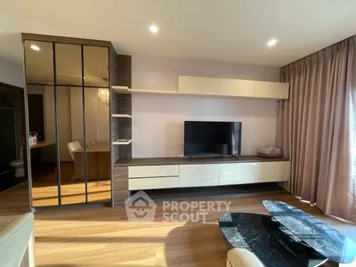 Modern living room with sleek TV unit and stylish decor