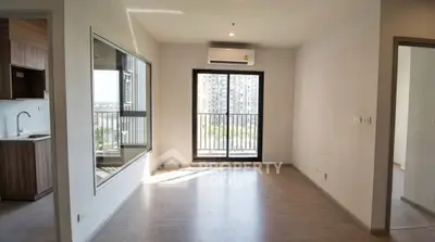 Spacious modern apartment with open layout and balcony view