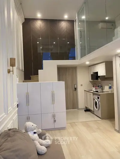 Modern duplex apartment with stylish interior and in-unit laundry