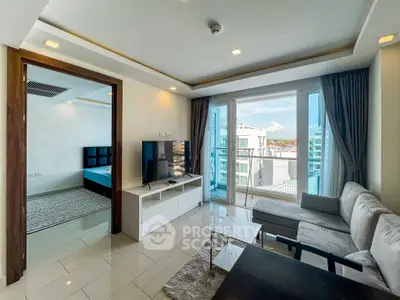 Modern living room with balcony view and stylish furniture in a contemporary apartment.