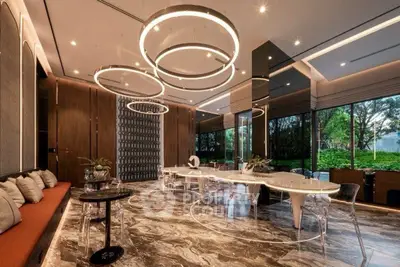 Luxurious modern living room with elegant lighting and marble flooring, offering a stunning garden view.
