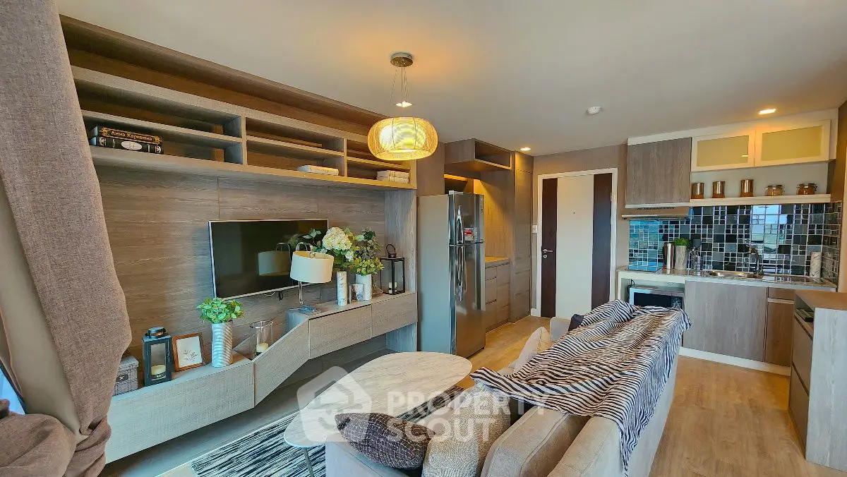 Modern living room with open kitchen and stylish decor