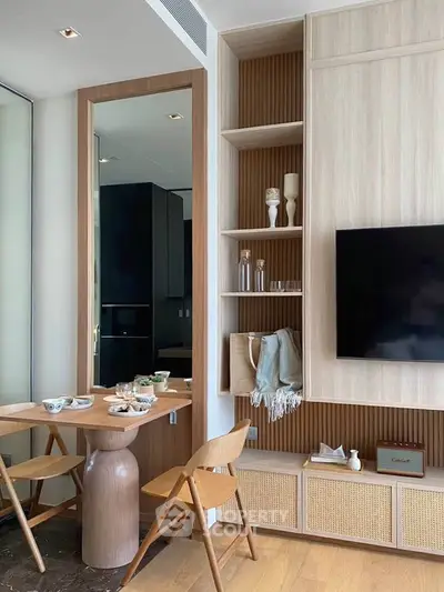 Modern living room with stylish wooden furniture and wall-mounted TV