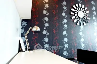 Stylish study room with modern decor and unique wall clock