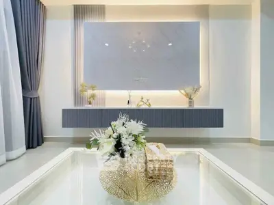 Elegant modern living room with stylish decor and ambient lighting