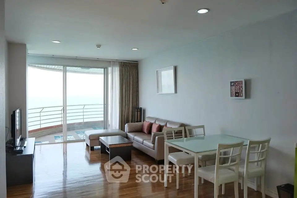 Spacious living room with ocean view and modern furnishings