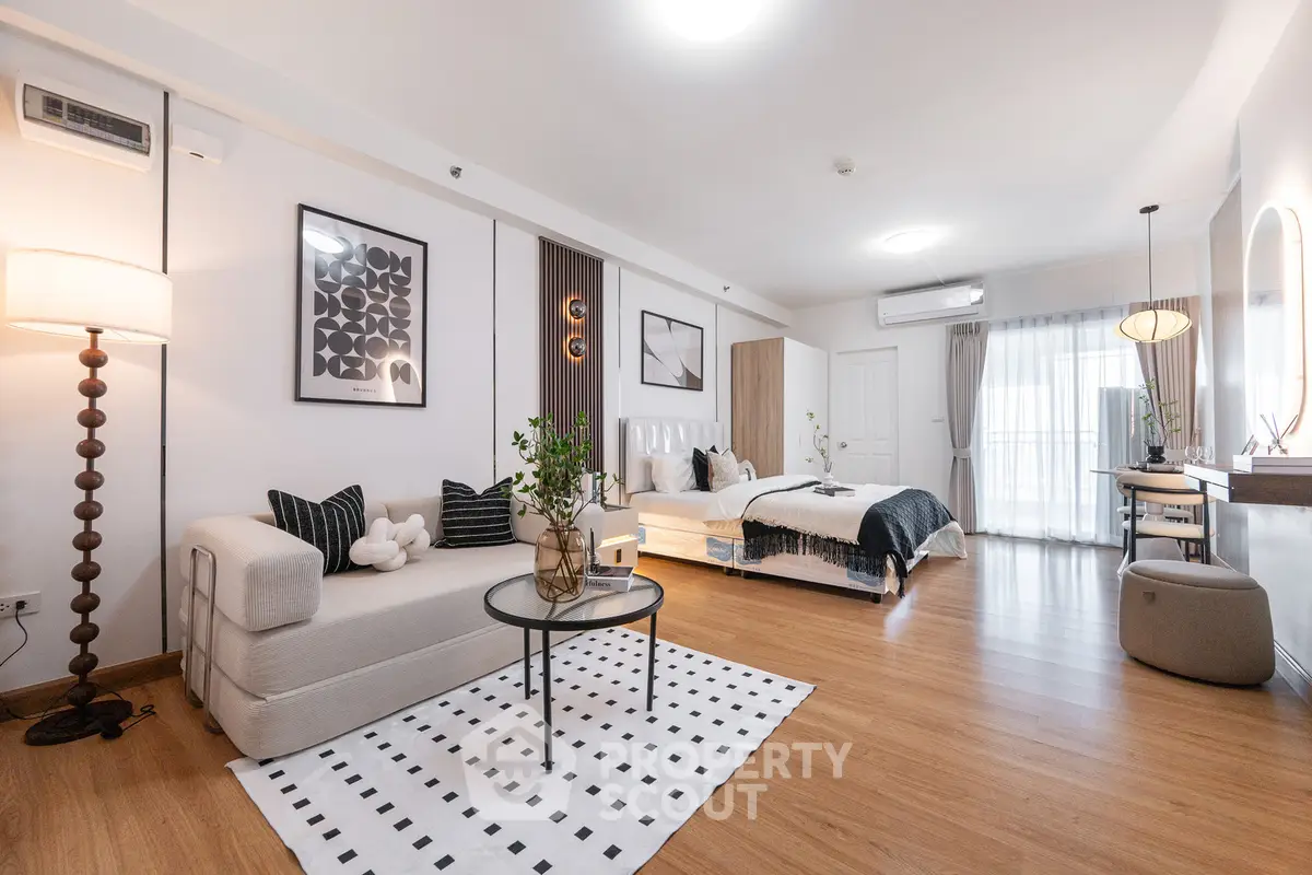 Spacious modern studio apartment with stylish decor and natural light