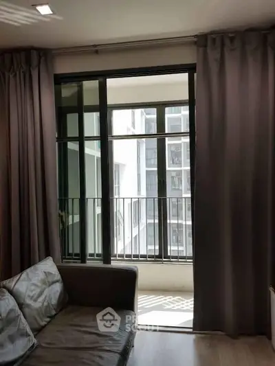 Modern living room with balcony view in a stylish apartment