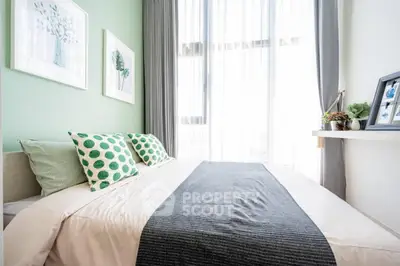 Bright and modern bedroom with large window and stylish decor