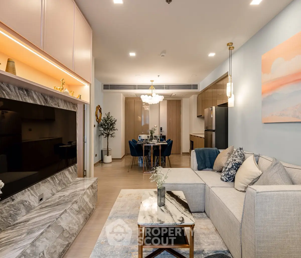 Luxurious modern living room with elegant decor and open dining area