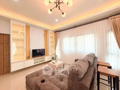 Spacious living room with modern decor and cozy seating area