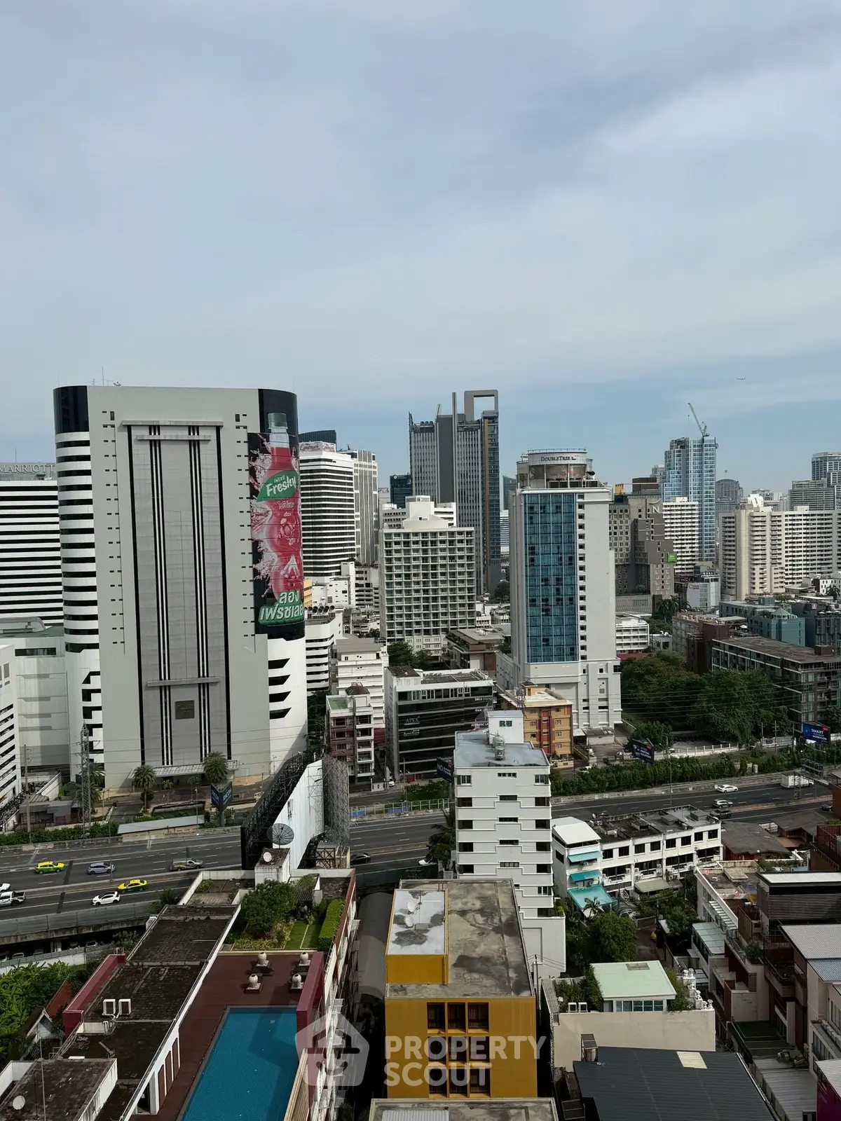 Stunning cityscape view showcasing modern high-rise buildings and urban skyline.