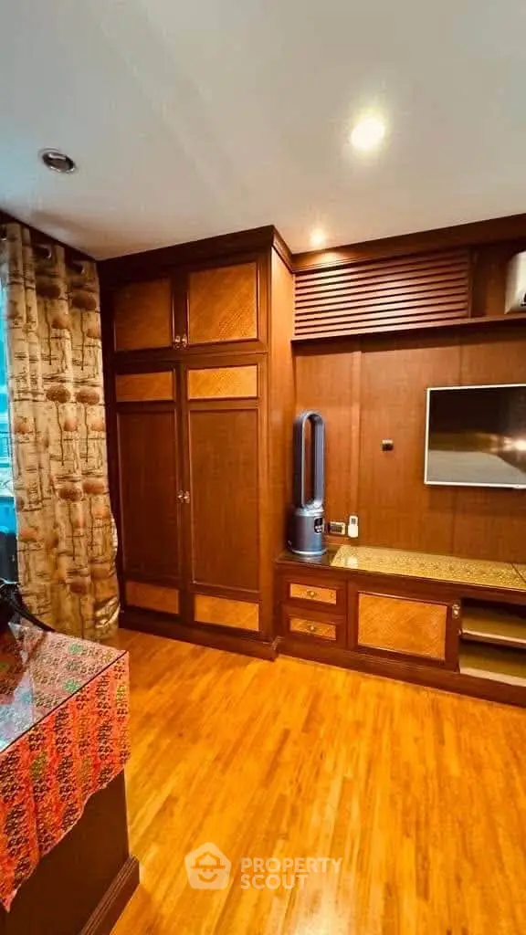 Luxurious wooden interior with built-in cabinets and modern decor