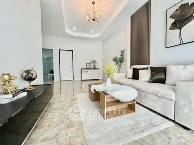 Elegant living room with modern decor and plush furnishings