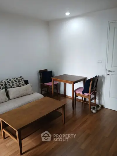 Cozy living room with wooden furniture and minimalist decor