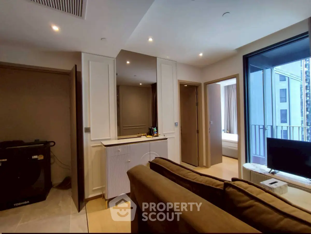 Modern apartment interior with cozy living room and balcony view