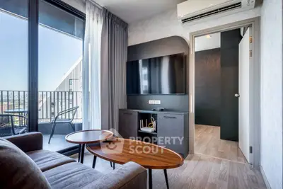 Modern living room with balcony view and sleek furniture