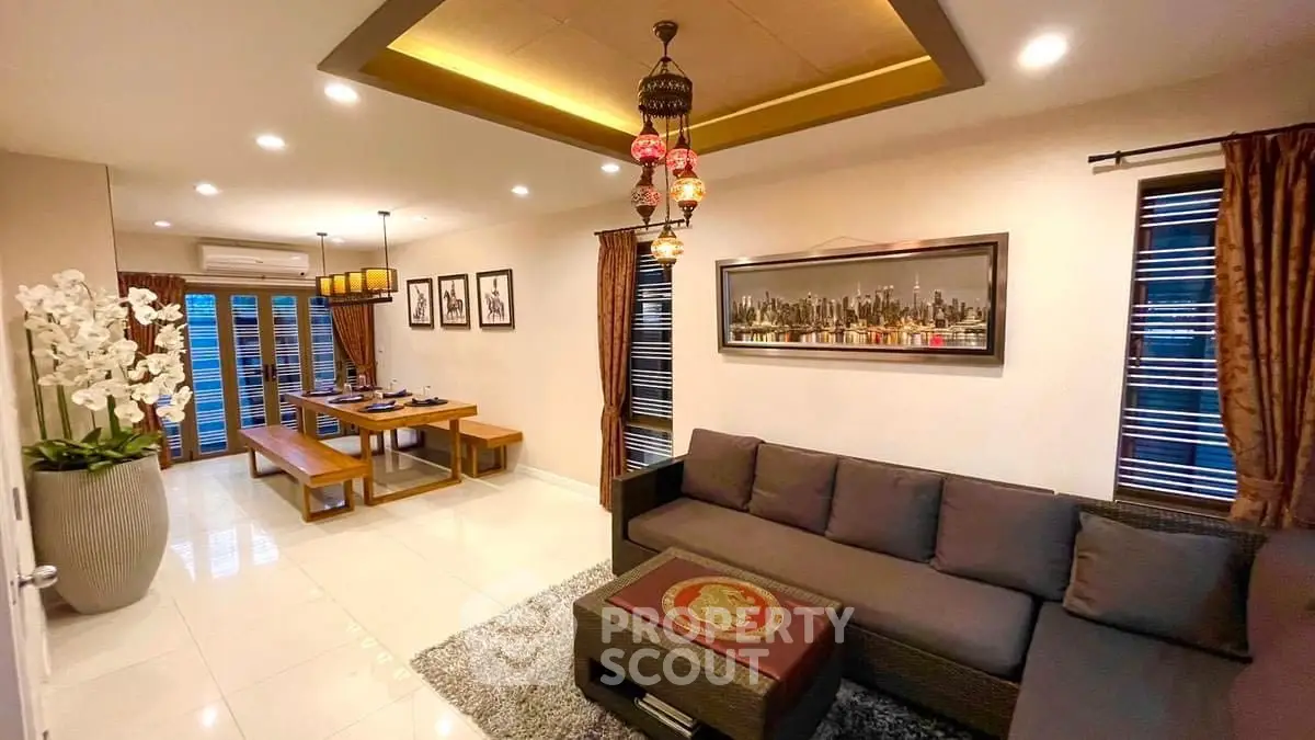 Luxurious living room with elegant decor and spacious dining area
