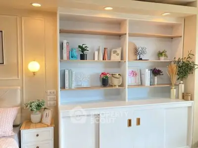 Elegant living room with stylish built-in shelves and modern decor accents
