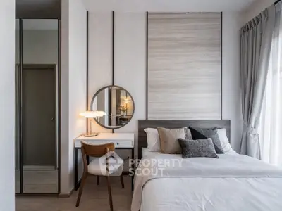 Modern bedroom with stylish decor and natural light